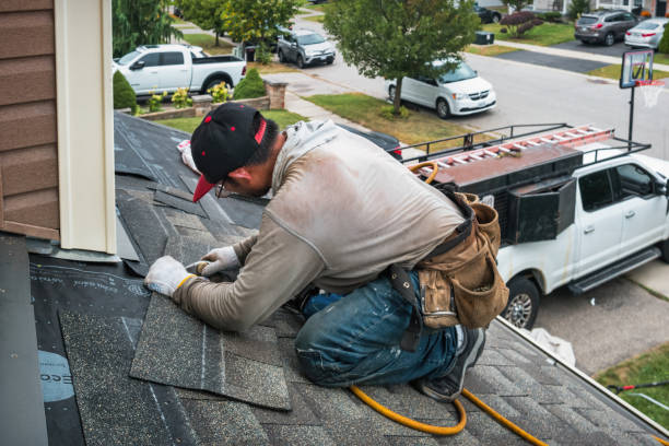 Professional Storm Damage Roof Repair technician working in Hastings, PA